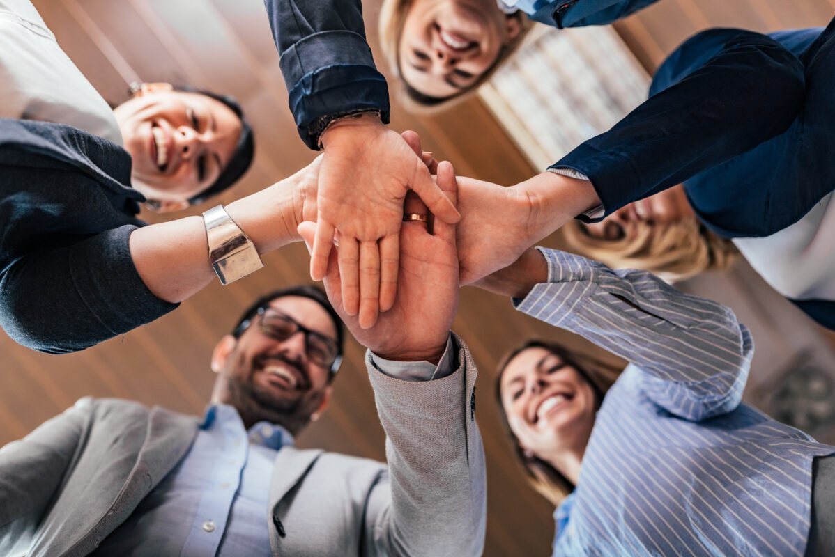 Team building, partnership, business success concept. Bottom vie